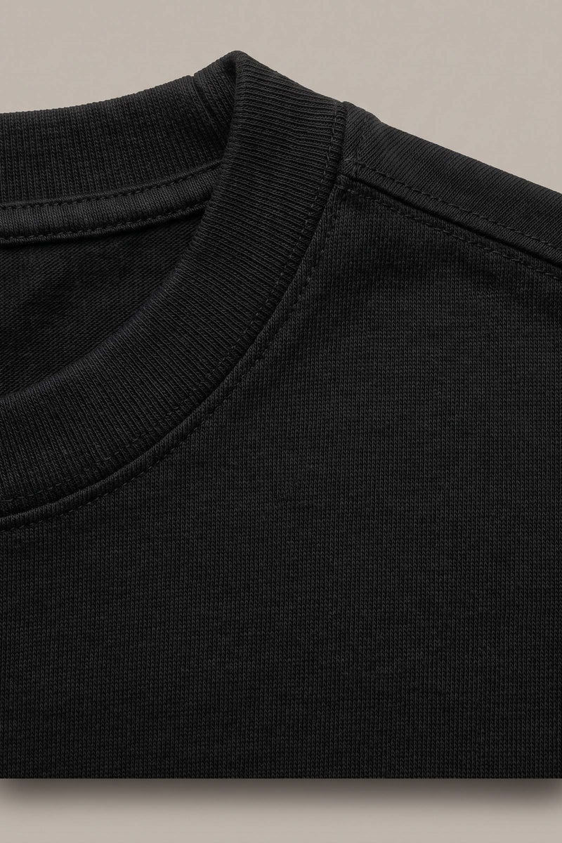 Harald t-shirt i svart — tygdetalj